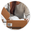 A woman unboxing a package